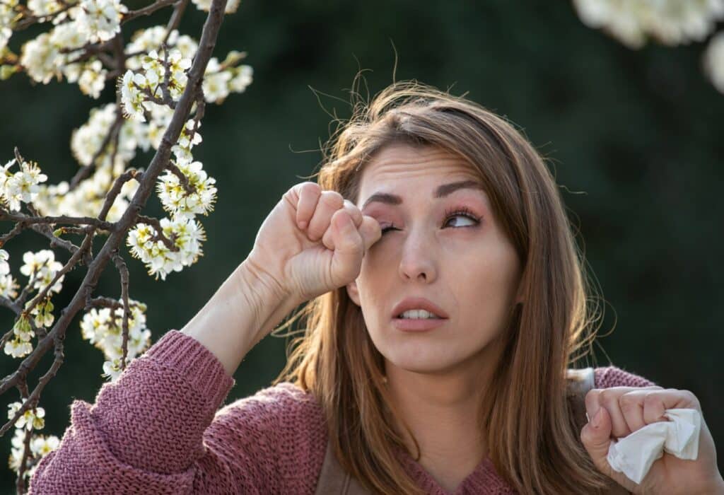 girl rubbing eyes in front of blooming tree.jpg s=1024x1024&w=is&k=20&c=qaylveg9rWa8xcinnCz8nHHkcgV4MFBHvn97FQr3EQ0=